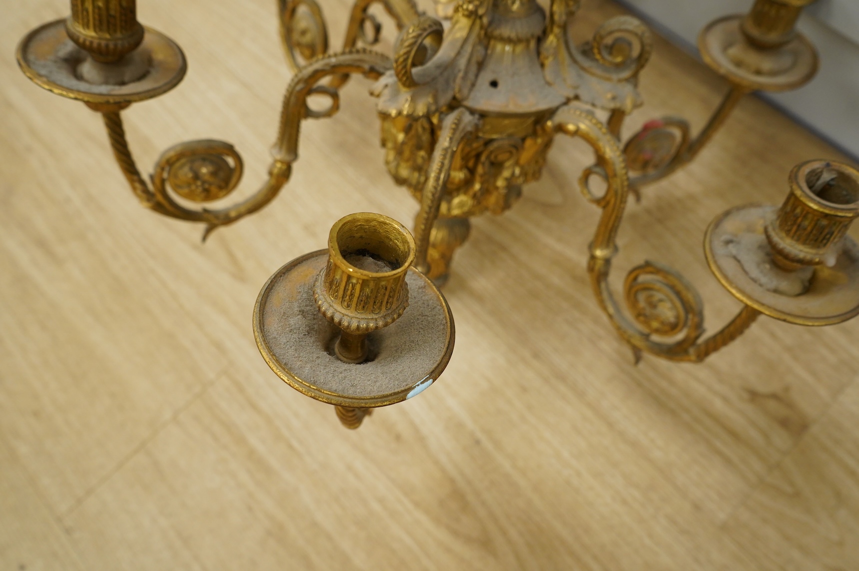 A Louis XVI style six branch ormolu electrolier, 62cm high